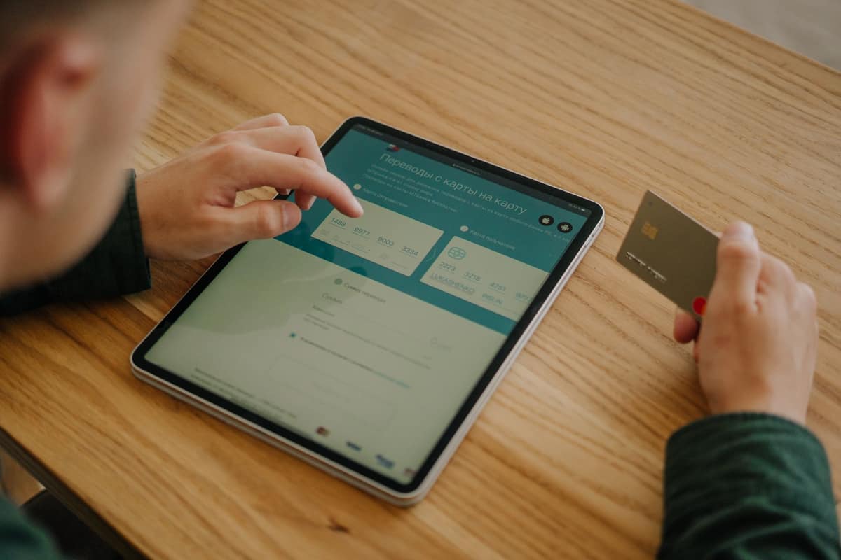 Someone paying for an online order on a tablet