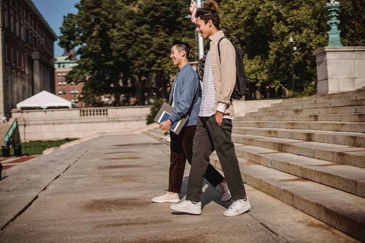 Students walking together outside a university building