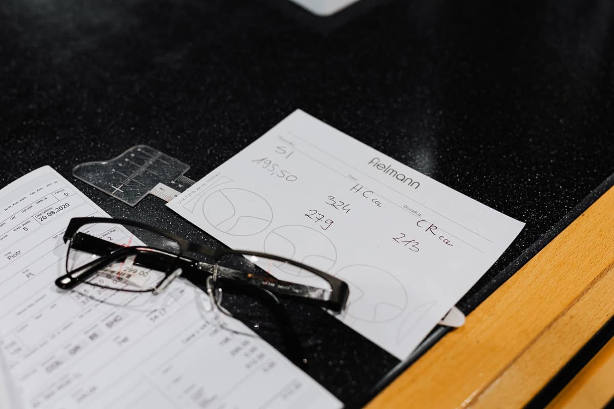 Reading glasses resting on a printed document