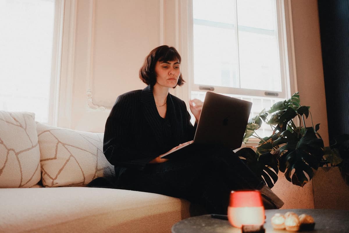 A laptop playing a show in a bright room