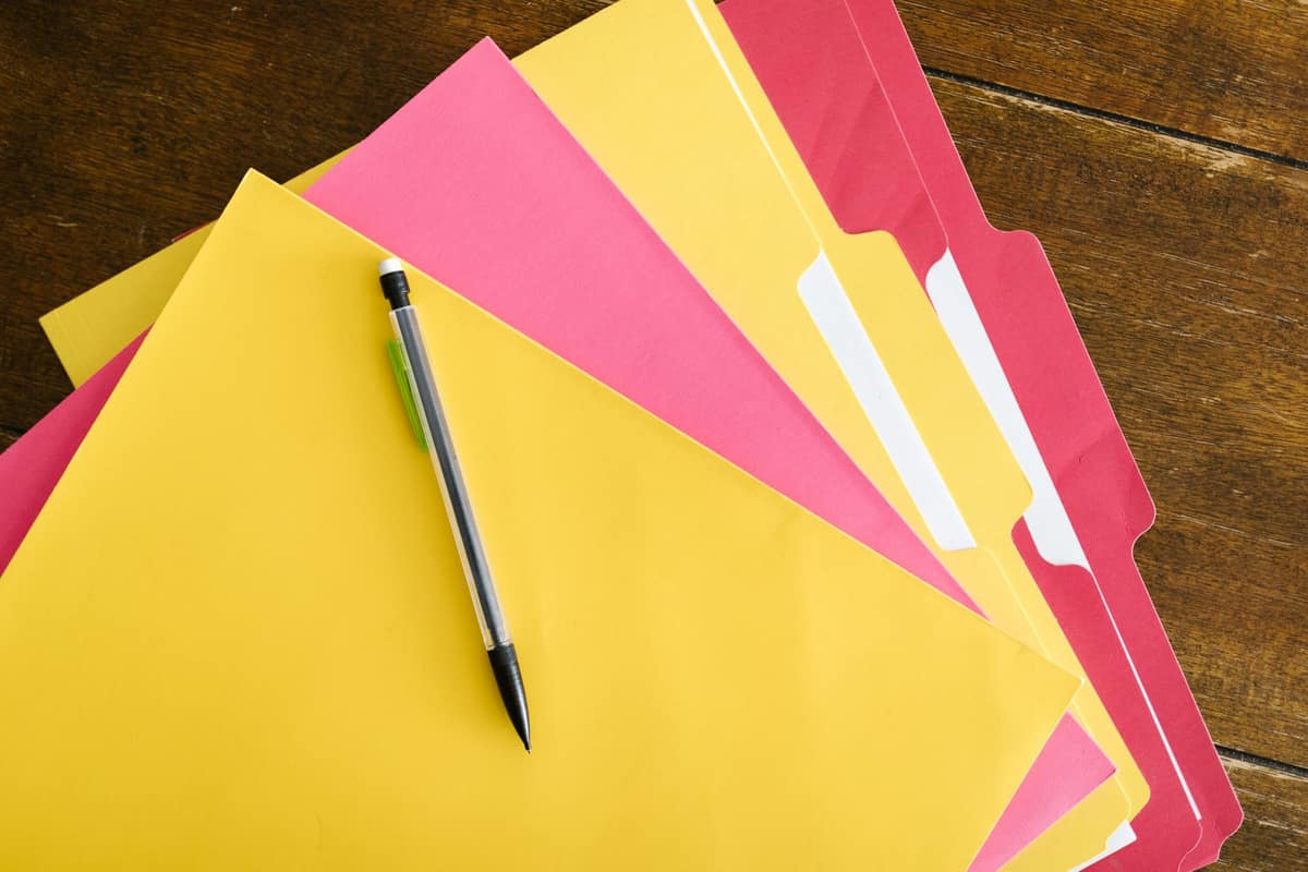 Documents and a pen on a bright desk