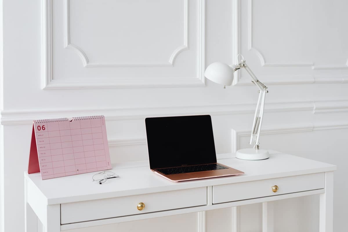A wall calendar in a bright room